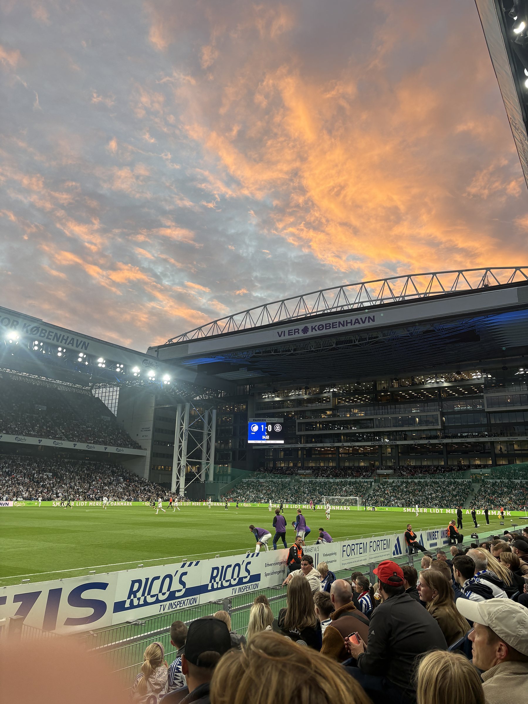 Parken at sunset from the stands, 1-0 on the scoreboard